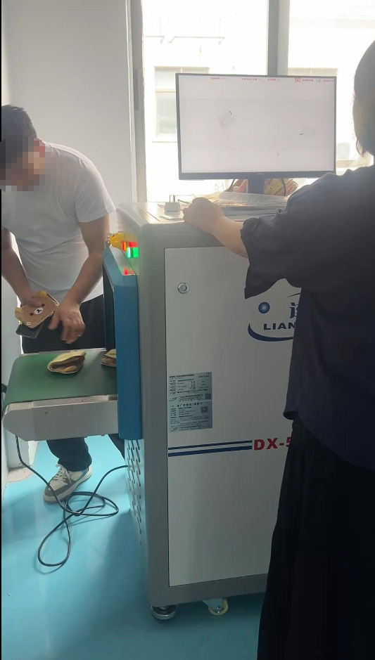 東莞市橋頭某某手袋箱包制品有限公司——使用連新牌DX-5030C-X光安檢機